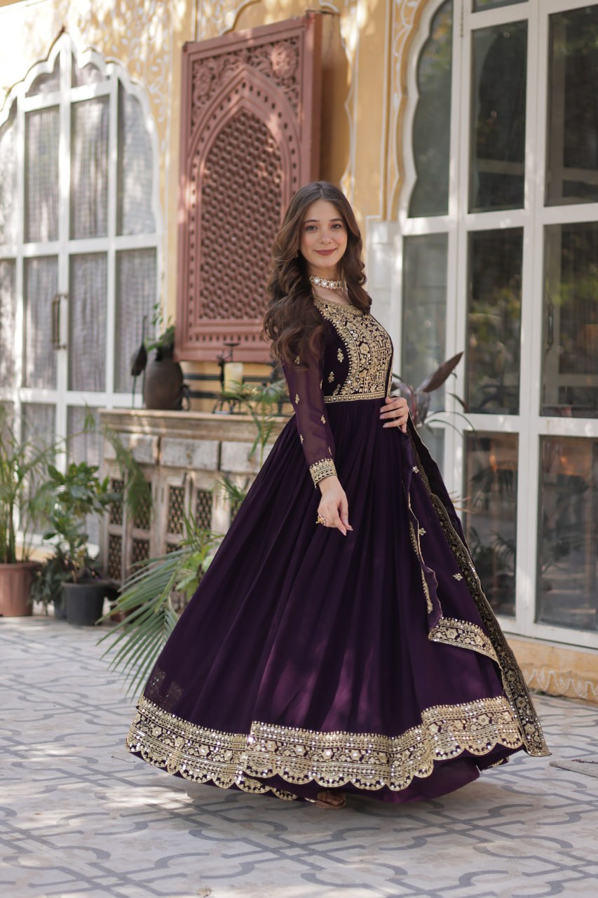 Women's Luxurious Plum Velvet Anarkali Gown with Heavy Gold Zari & Sequin Embroidery β Perfect for Weddings & Grand Festivities